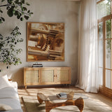 Gilded Gears II by Laura Marshall. Shown in a natural wood frame in a cozy modern living room. Available as an archival giclee rolled canvas, fine art paper, or poster print. SKU 25870a.