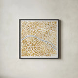 Gilded Paris Map by Laura Marshall. Shown in a sleek black glass frame for a contemporary gallery look. Available as an archival giclee rolled canvas, fine art paper, or poster print. SKU 17663a.