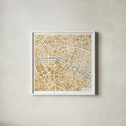 Gilded Paris Map by Laura Marshall. Shown in a crisp white glass frame for a clean and minimalist style. Available as an archival giclee rolled canvas, fine art paper, or poster print. SKU 17663a.