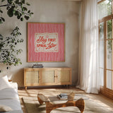 Girly Pop I by Laura Marshall. Shown in a natural wood frame in a cozy modern living room. Available as an archival giclee rolled canvas, fine art paper, or poster print. SKU 99793a.