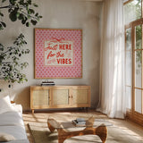 Girly Pop II by Laura Marshall. Shown in a natural wood frame in a cozy modern living room. Available as an archival giclee rolled canvas, fine art paper, or poster print. SKU 99794a.