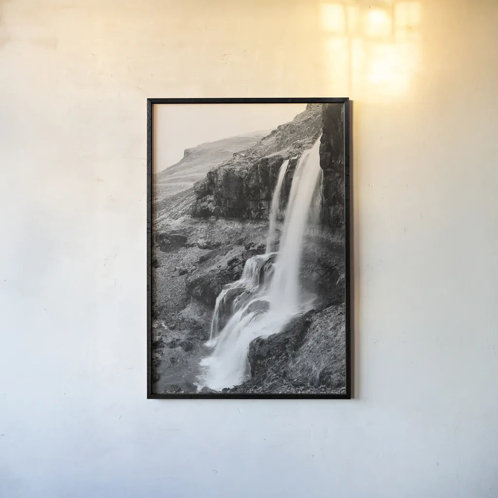 Hidden Waterfall by Laura Marshall. shown as a paper print in a black flame. Available as a archival giclee rolled canvas, fine art paper, or poster print. SKU 64394h.