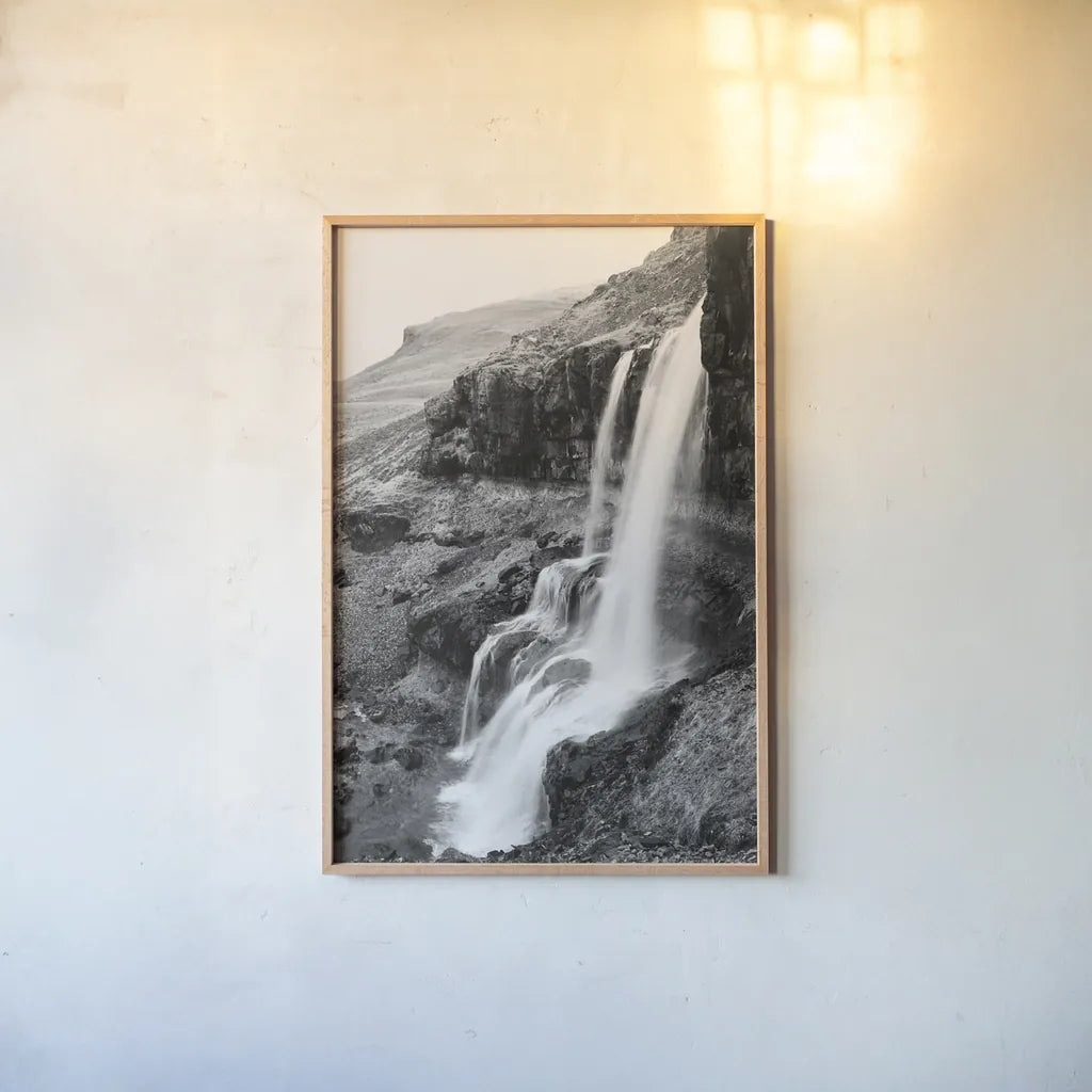 Hidden Waterfall by Laura Marshall. shown as a paper print in a natural frame. Available as a archival giclee rolled canvas, fine art paper, or poster print. SKU 64394h.