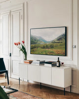 Highland Mountains by Laura Marshall. shown as a framed stretched canvas in a living room above a console. Available as a archival giclee rolled canvas, fine art paper, or poster print. SKU 81312i.
