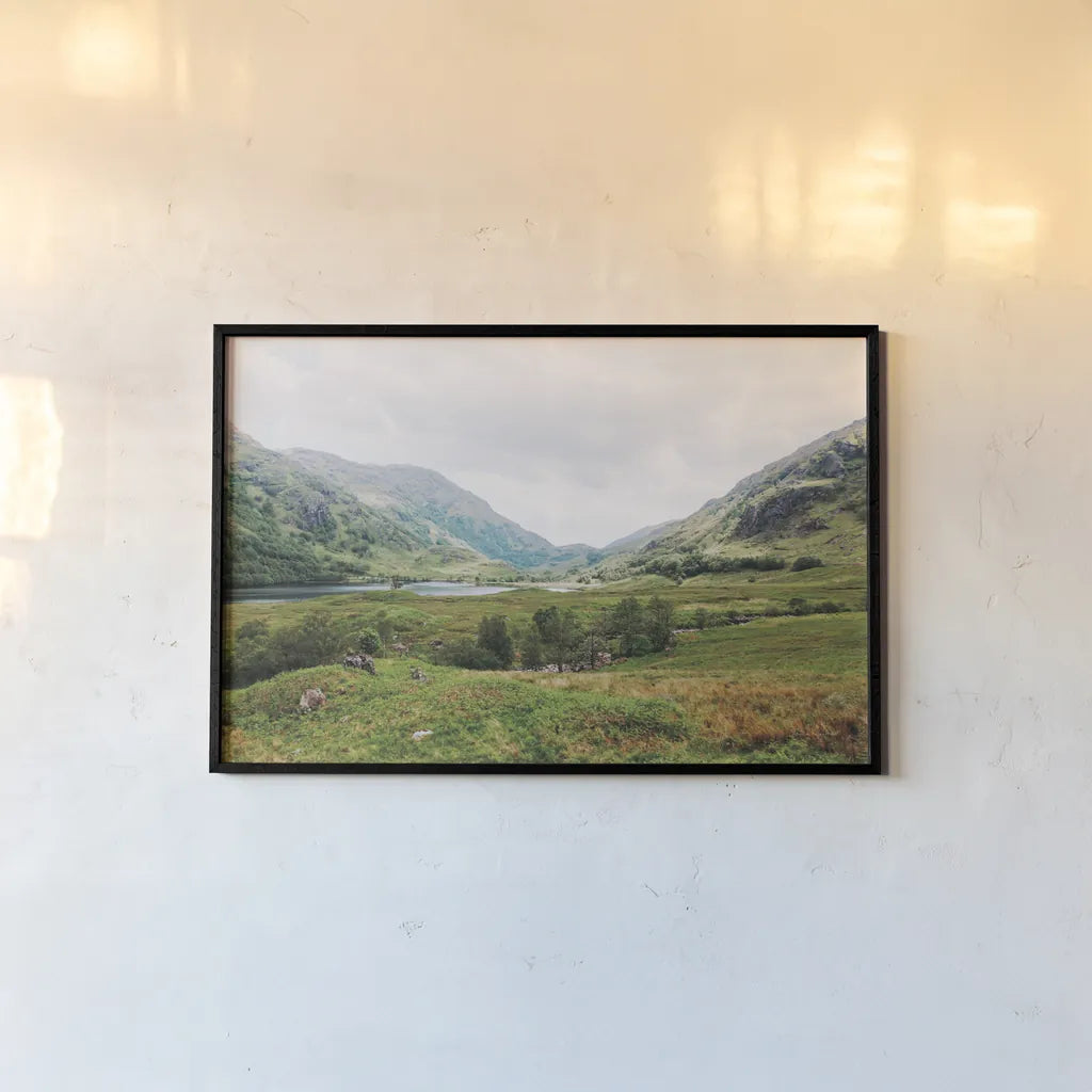Highland Mountains by Laura Marshall. shown as a paper print in a black flame. Available as a archival giclee rolled canvas, fine art paper, or poster print. SKU 81312i.
