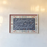 Homespun Americana I v2 by Laura Marshall. shown as a paper print in a white frame. Available as a archival giclee rolled canvas, fine art paper, or poster print. SKU 104921i.