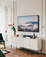 Hurricane Ridge II by Laura Marshall. shown as a framed stretched canvas in a living room above a console. Available as a archival giclee rolled canvas, fine art paper, or poster print. SKU 63266i.
