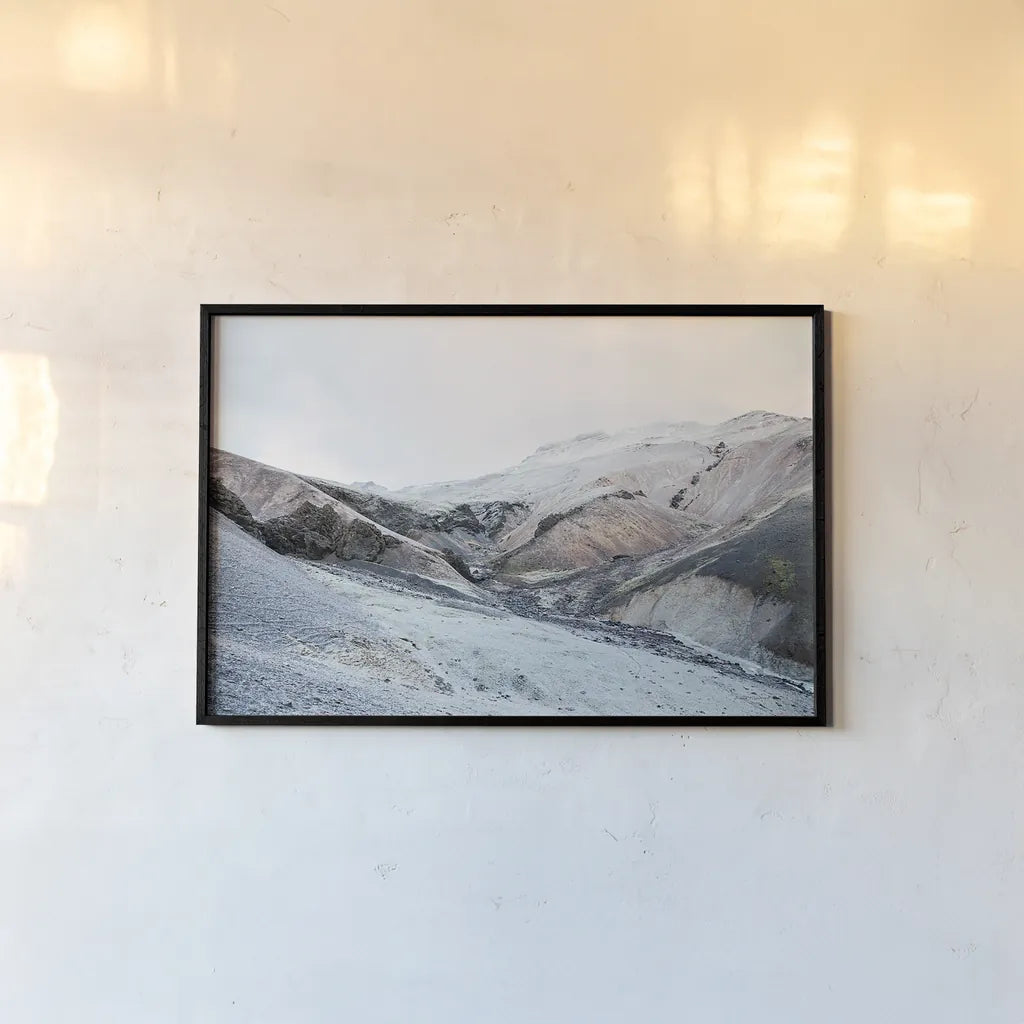 Iceland Hills I by Laura Marshall. shown as a paper print in a black flame. Available as a archival giclee rolled canvas, fine art paper, or poster print. SKU 63269i.