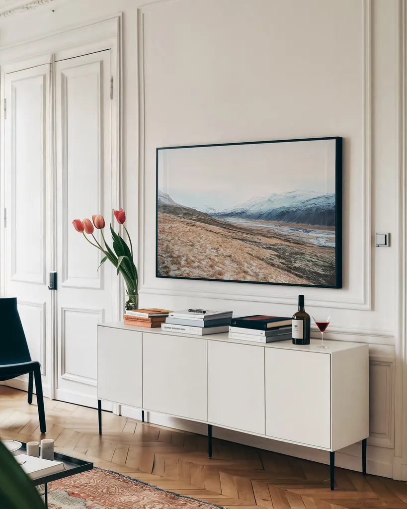 Iceland Hills II by Laura Marshall. shown as a framed stretched canvas in a living room above a console. Available as a archival giclee rolled canvas, fine art paper, or poster print. SKU 63270i.