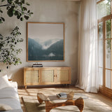 Landscape I Blue by Laura Marshall. Shown in a natural wood frame in a cozy modern living room. Available as an archival giclee rolled canvas, fine art paper, or poster print. SKU 56285a.