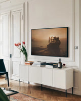 Last Light by Laura Marshall. shown as a framed stretched canvas in a living room above a console. Available as a archival giclee rolled canvas, fine art paper, or poster print. SKU 42970i.