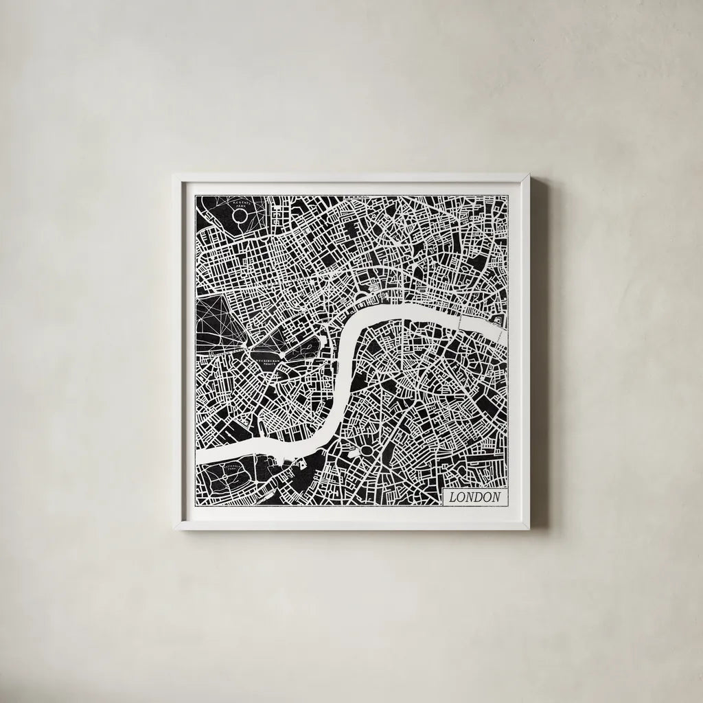 London Map Black by Laura Marshall. Shown in a crisp white glass frame for a clean and minimalist style. Available as an archival giclee rolled canvas, fine art paper, or poster print. SKU 60392a.