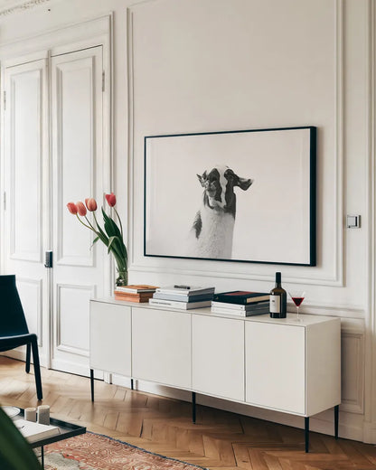 Lovable Llama I by Laura Marshall. shown as a framed stretched canvas in a living room above a console. Available as a archival giclee rolled canvas, fine art paper, or poster print. SKU 28488i.