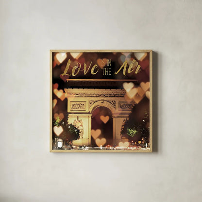 Love is in the Air Arc de Triomphe by Laura Marshall. Shown in a natural wood glass frame for a timeless modern aesthetic. Available as an archival giclee rolled canvas, fine art paper, or poster print. SKU 32258a.
