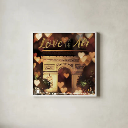 Love is in the Air Arc de Triomphe by Laura Marshall. Shown in a crisp white glass frame for a clean and minimalist style. Available as an archival giclee rolled canvas, fine art paper, or poster print. SKU 32258a.