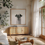 Loveable Llama II Crop by Laura Marshall. Shown in a natural wood frame in a cozy modern living room. Available as an archival giclee rolled canvas, fine art paper, or poster print. SKU 28489a.