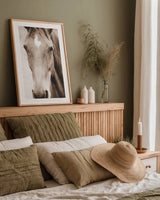 Moke Lake Horses I Sepia by Laura Marshall. shown as a paper print in a natural frame. Available as a archival giclee rolled canvas, fine art paper, or poster print. SKU 84983h.