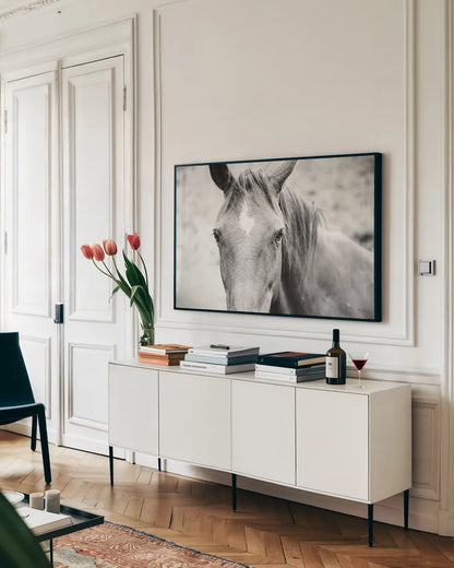 Moke Lake Horses II by Laura Marshall. shown as a framed stretched canvas in a living room above a console. Available as a archival giclee rolled canvas, fine art paper, or poster print. SKU 84130i.