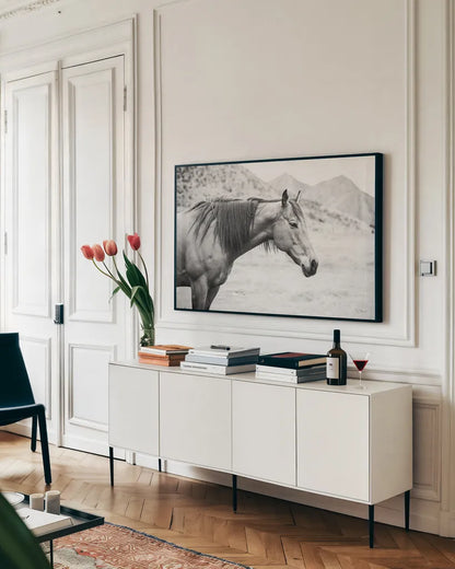 Moke Lake Horses III by Laura Marshall. shown as a framed stretched canvas in a living room above a console. Available as a archival giclee rolled canvas, fine art paper, or poster print. SKU 84131i.