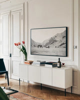 Moke Lake Horses IV by Laura Marshall. shown as a framed stretched canvas in a living room above a console. Available as a archival giclee rolled canvas, fine art paper, or poster print. SKU 84132i.