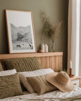Moke Lake Horses V by Laura Marshall. shown as a paper print in a natural frame. Available as a archival giclee rolled canvas, fine art paper, or poster print. SKU 84133h.