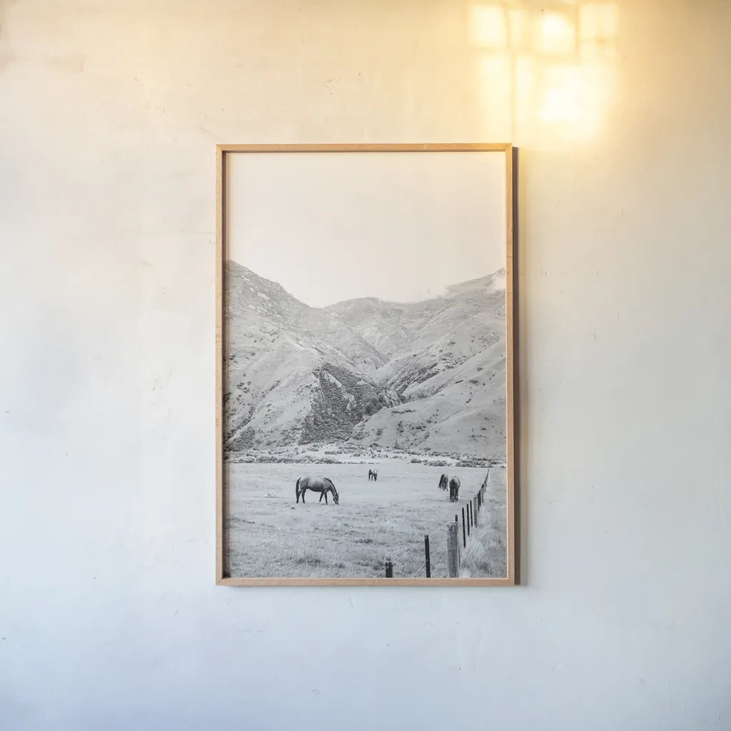 Moke Lake Horses V by Laura Marshall. shown as a paper print in a natural frame. Available as a archival giclee rolled canvas, fine art paper, or poster print. SKU 84133h.