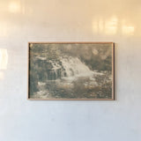 Mosquito Falls II by Laura Marshall. shown as a paper print in a natural frame. Available as a archival giclee rolled canvas, fine art paper, or poster print. SKU 21258i.