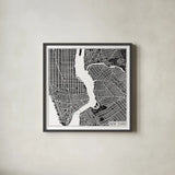 New York Map Black by Laura Marshall. Shown in a sleek black glass frame for a contemporary gallery look. Available as an archival giclee rolled canvas, fine art paper, or poster print. SKU 60390a.