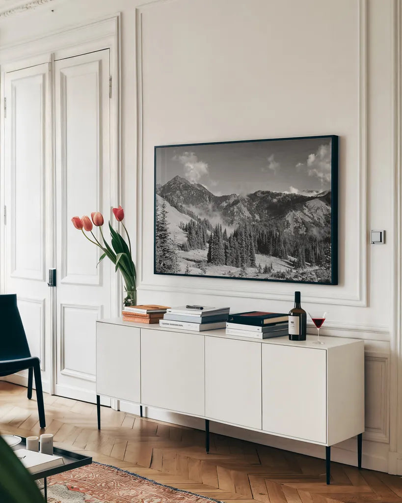 Olympic Mountains I by Laura Marshall. shown as a framed stretched canvas in a living room above a console. Available as a archival giclee rolled canvas, fine art paper, or poster print. SKU 64412i.