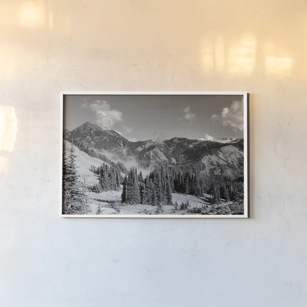 Olympic Mountains I by Laura Marshall. shown as a paper print in a white frame. Available as a archival giclee rolled canvas, fine art paper, or poster print. SKU 64412i.