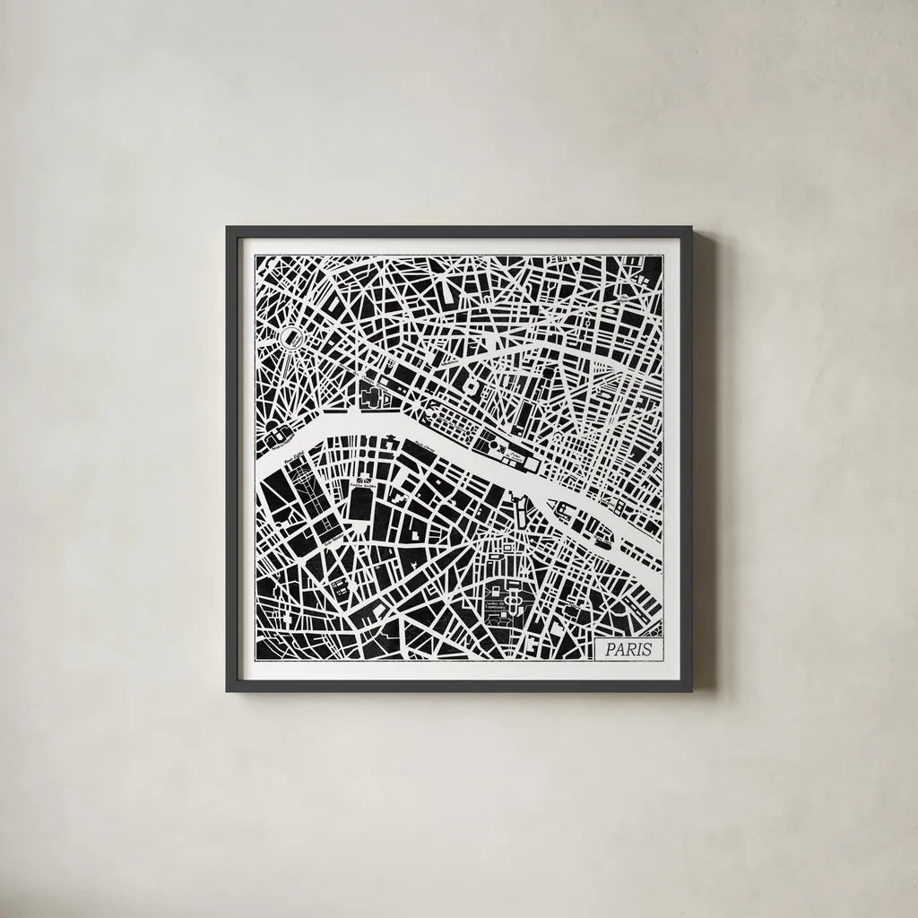 Paris Map Black by Laura Marshall. Shown in a sleek black glass frame for a contemporary gallery look. Available as an archival giclee rolled canvas, fine art paper, or poster print. SKU 60391a.