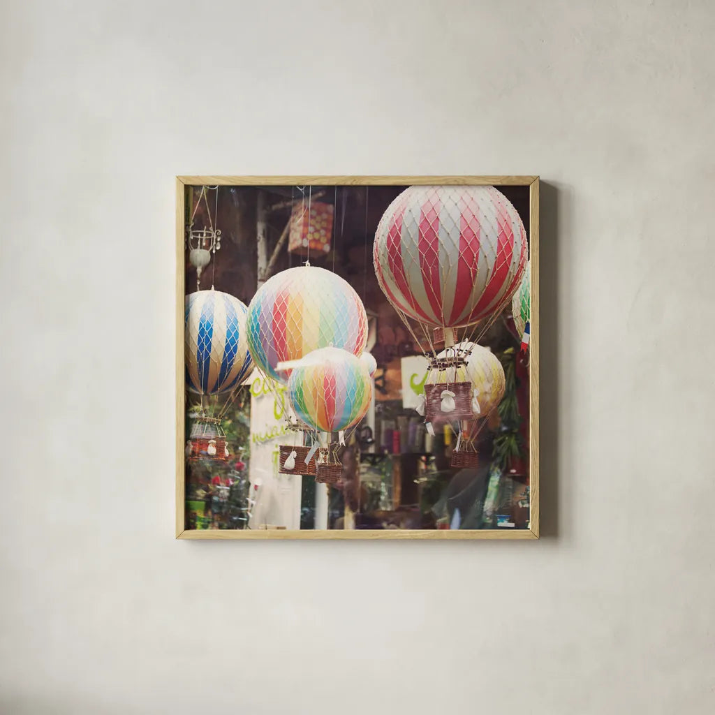 Paris Moments I by Laura Marshall. Shown in a natural wood glass frame for a timeless modern aesthetic. Available as an archival giclee rolled canvas, fine art paper, or poster print. SKU 25889a.