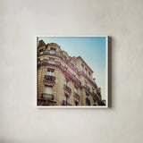 Paris Moments II by Laura Marshall. Shown in a crisp white glass frame for a clean and minimalist style. Available as an archival giclee rolled canvas, fine art paper, or poster print. SKU 25890a.
