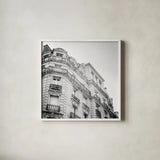 Paris Moments II BW by Laura Marshall. Shown in a crisp white glass frame for a clean and minimalist style. Available as an archival giclee rolled canvas, fine art paper, or poster print. SKU 78245a.