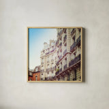 Paris Moments III by Laura Marshall. Shown in a natural wood glass frame for a timeless modern aesthetic. Available as an archival giclee rolled canvas, fine art paper, or poster print. SKU 25891a.