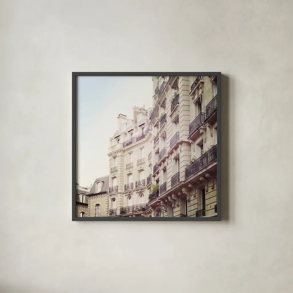 Paris Moments III Neutral v2 by Laura Marshall. Shown in a sleek black glass frame for a contemporary gallery look. Available as an archival giclee rolled canvas, fine art paper, or poster print. SKU 76216a.