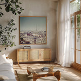 Paris Moments VI by Laura Marshall. Shown in a natural wood frame in a cozy modern living room. Available as an archival giclee rolled canvas, fine art paper, or poster print. SKU 25894a.