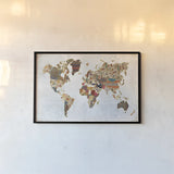 Pattern World Map by Laura Marshall. shown as a paper print in a black flame. Available as a archival giclee rolled canvas, fine art paper, or poster print. SKU 22904i.