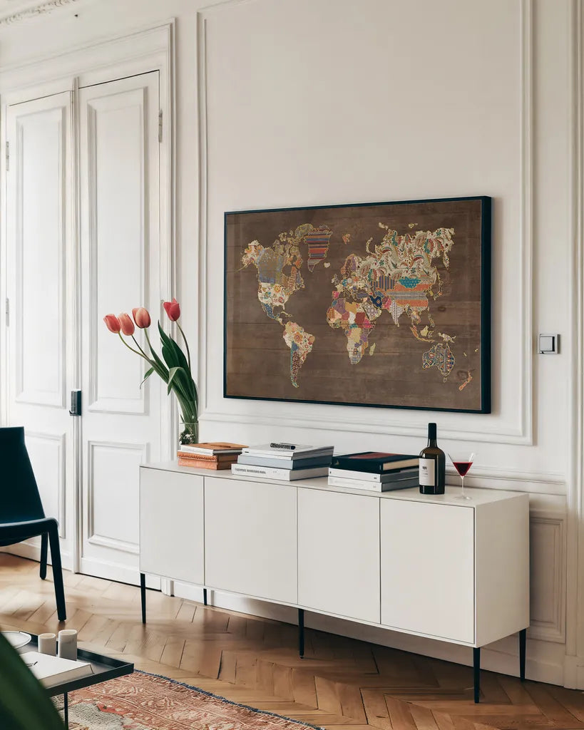 Pattern World Map on Wood by Laura Marshall. shown as a framed stretched canvas in a living room above a console. Available as a archival giclee rolled canvas, fine art paper, or poster print. SKU 28259i.