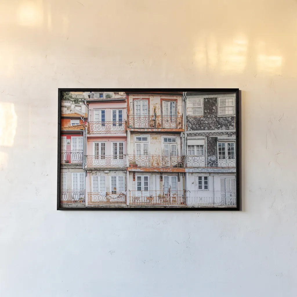 Porto Houses by Laura Marshall. shown as a paper print in a black flame. Available as a archival giclee rolled canvas, fine art paper, or poster print. SKU 81307i.