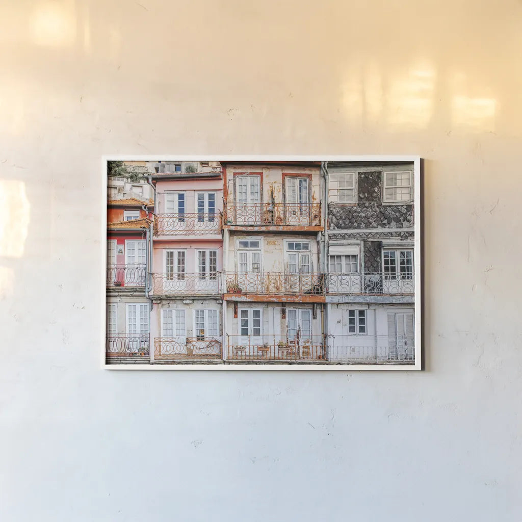 Porto Houses by Laura Marshall. shown as a paper print in a white frame. Available as a archival giclee rolled canvas, fine art paper, or poster print. SKU 81307i.