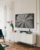 Raindrops on Lupine by Laura Marshall. shown as a framed stretched canvas in a living room above a console. Available as a archival giclee rolled canvas, fine art paper, or poster print. SKU 48181i.