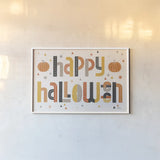 Retro Halloween I by Laura Marshall. shown as a paper print in a white frame. Available as a archival giclee rolled canvas, fine art paper, or poster print. SKU 59591i.