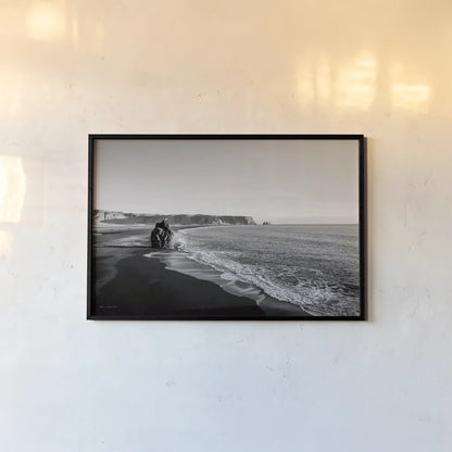 Reynisfjara by Laura Marshall. shown as a paper print in a black flame. Available as a archival giclee rolled canvas, fine art paper, or poster print. SKU 64400i.
