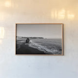 Reynisfjara by Laura Marshall. shown as a paper print in a natural frame. Available as a archival giclee rolled canvas, fine art paper, or poster print. SKU 64400i.