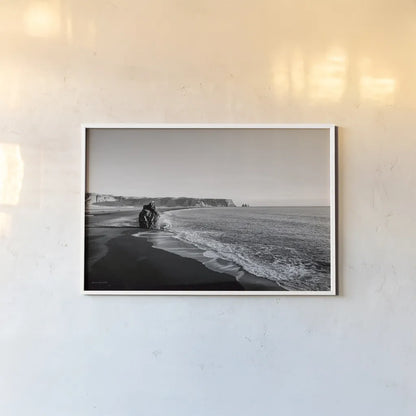 Reynisfjara by Laura Marshall. shown as a paper print in a white frame. Available as a archival giclee rolled canvas, fine art paper, or poster print. SKU 64400i.