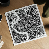 Rome Map Black by Laura Marshall. Shown as a detailed flat fine art print, highlighting archival giclee quality. Available as an archival giclee rolled canvas, fine art paper, or poster print. SKU 60393a.
