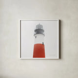 Sankaty Head Light by Laura Marshall. Shown in a crisp white glass frame for a clean and minimalist style. Available as an archival giclee rolled canvas, fine art paper, or poster print. SKU 38773a.