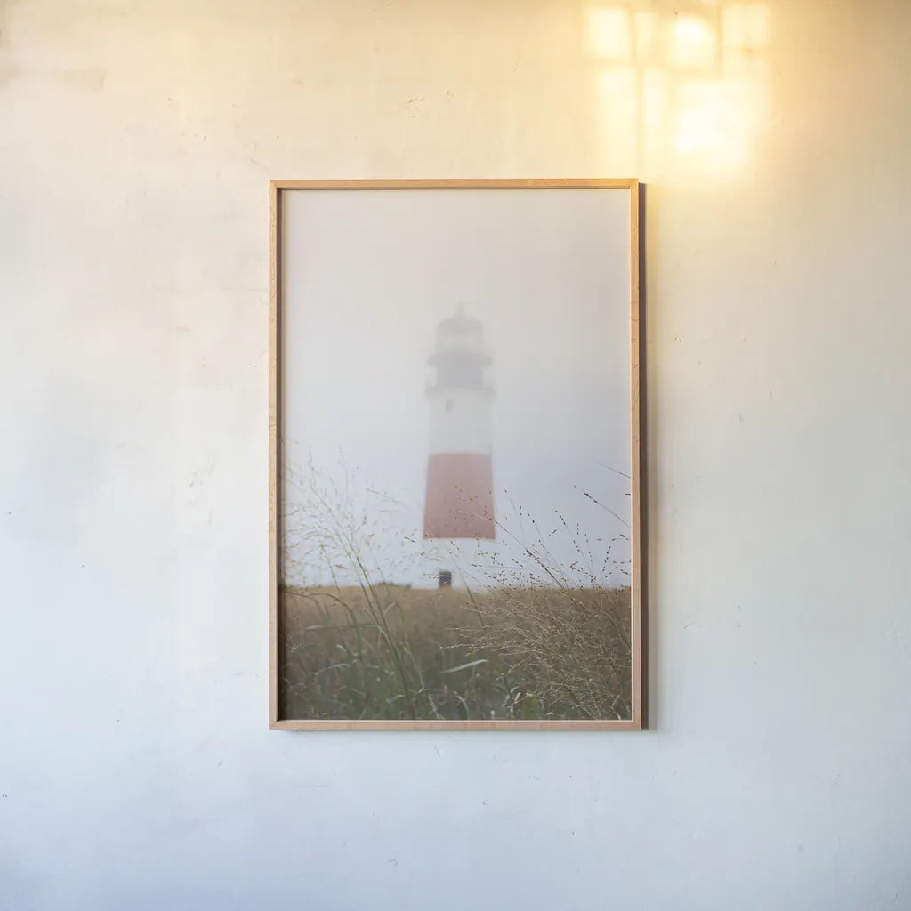 Sankaty Head in the Fog by Laura Marshall. shown as a paper print in a natural frame. Available as a archival giclee rolled canvas, fine art paper, or poster print. SKU 39642h.