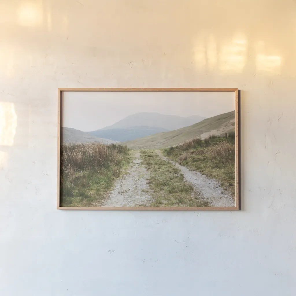 Scottish Highlands I by Laura Marshall. shown as a paper print in a natural frame. Available as a archival giclee rolled canvas, fine art paper, or poster print. SKU 63275i.